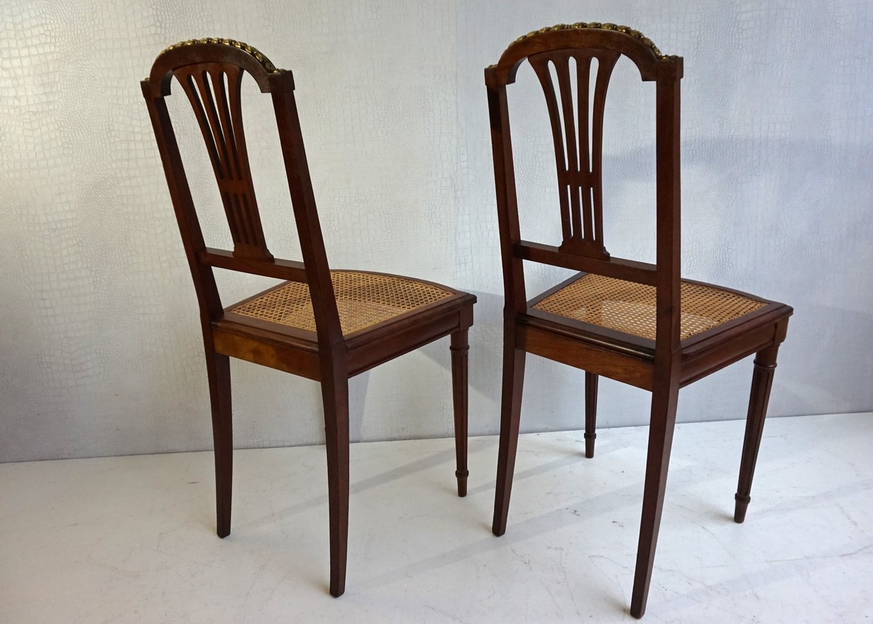 Antique pair of French Louis XV bergère chairs.