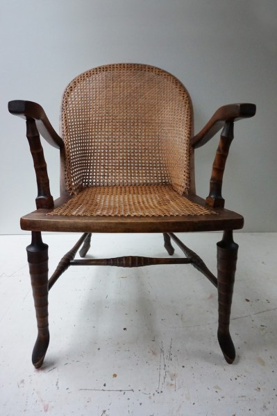 webbing-rotan-armstoel-springbok-antilope-hoorns-rattan-vintage-armchair-00001